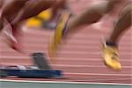 Blurred image of runners on track
