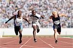 Three Sprinters Crossing the Finish Line