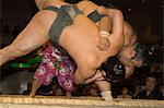 Sumo wrestlers competing, Grand Taikai Sumo Wrestling Tournament, Kokugikan Hall Stadium, Ryogoku district, Tokyo, Japan, Asia