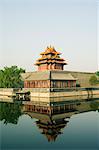 A reflection of the Palace Wall Tower in the moat of The Forbidden City Palace Museum, UNESCO World Heritage Site, Beijing, China, Asia