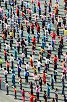 Junior school children exercising in colourful clothes, Beijing, China, Asia