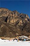 Beginners slopes under mountain scenery at Shijinglong ski resort, Beijing, China, Asia