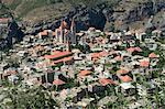 St. Saba Church and red tile roofed town, Bcharre, Qadisha Valley, UNESCO World Heritage Site, North Lebanon, Middle East