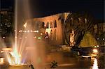 Fountain and water wheel on the Orontes River at night, Hama, Syria, Middle East