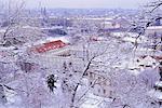 Snow covered Mala Strana and Stare Mesto rooftops, Prague, Czech Republic, Europe