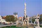 Baroque Marian Column dating from 1717 and Baroque Holy Name of Jesus Church dating from 1667 at namesti Zachariase z Hradce (square), Telc, UNESCO World Heritage Site, Jihlavsko, Czech Republic, Europe