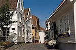 A street of wooden houses in the old town adjacent to the harbour, Stavanger, Norway, Scandinavia, Europe