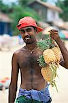 Pineapple seller on the beach, Hikkaduwa, Sri Lanka, Asia