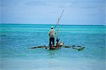 Man sailing a fishing boat on the Indian Ocean, Zanzibar, Tanzania, East Africa, Africa