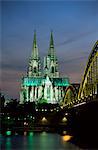 Cologne Cathedral, UNESCO World Heritage Site, and Hohenzollern Bridge at night, Cologne, North Rhine Westphalia, Germany, Europe