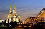 Cologne cathedral, UNESCO World Heritage Site, and Hohenzollern bridge at night, Cologne, North Rhine Westphalia, Germany, Europe