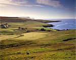 View of Trebister (Gulberwick) and Trebister Ness, south of Lerwick in a morning light, Bressay visible in the distance and The Ord cliffs and Bard Head, Mainland, Shetland Islands, Scotland, United Kingdom, Europe