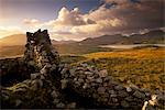 Old blackhouse ruin near Timsgarry (Timsgearraidh), west coast, sunset. Isle of Lewis, Outer Hebrides, Scotland, United Kingdom, Europe