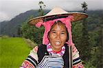 Woman of Hanj Minority working in terraced rice fields, Yuanyang, Yunnan Province, China, Asia