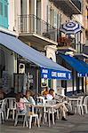 Outdoor dining along waterfront, Cannes, Alpes Maritimes, Provence, Cote d'Azur, French Riviera, France, Europe