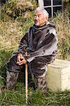 Native man wearing seal skin clothing, Museum in Nanortalik Port, Island of Qoornoq, Province of Kitaa, Southern Greenland, Kingdom of Denmark, Polar Regions