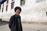 Man in hat, outside monastery, Jingang Si, Kangding, Sichuan, China, Asia