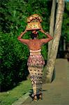 Woman carrying temple offerings, Bali, Indonesia, Southeast Asia, Asia