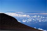 The two great 13000ft volcanic peaks of Mauna Loa on right, and Mauna Kea on the Big Island seen from the top of the Haleakala volcano, Maui, Hawaii, Hawaiian Islands, United States of America, Pacific, North America