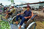 Cyclo drivers at a market in central Ho Chi Minh City (formerly Saigon), waiting for business, Vietnam, Indochina, Southeast Asia, Asia
