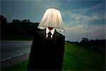 Businessman Wearing Lampshade