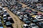 Old Cars Lined-up in Auto Wrecking Yard