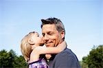 Daughter Kissing Father