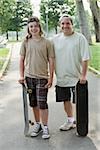 Father and son with skateboards