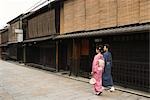 Young couple in kimono walking