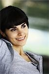 Woman smiling looking away with contentment