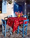 Table and blue chairs - southern terrace