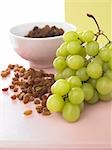 Bunch of white grapes and raisins