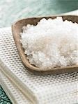 Peeling salts in a wooden bowl