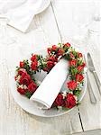 Napkin and a heartshape wreath of roses