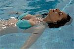 Woman is doing backstroke