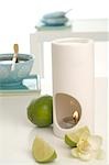 Aroma lamp,limes and orchid blossoms