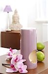 Aroma lamp with orchid blossoms and limes