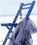 On the beach: blue folding chair