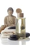 Kleine Buddha und Massage Öl