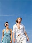 Couple in front of blue sky