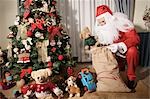 Santa Claus Putting Presents Under Christmas Tree