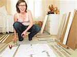 Woman building chest of drawers
