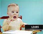 1960s SERIOUS THOUGHTFUL BABY AS BANKING LOAN OFFICER