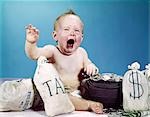 1960s BABY CRYING SHOUTING SCREAMING WITH BAGS OF MONEY AND BAG LABELED TAX