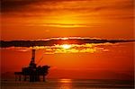 OFFSHORE OIL RIG SUNSET CALIFORNIA COAST