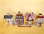 1960s 1970s STILL LIFE ROW OF FOUR ANTIQUE METAL COIN BANKS SHAPED LIKE BANK BUILDINGS