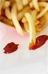 Gros plan de frites et Ketchup