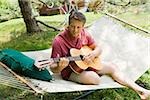 Man playing guitar outdoors