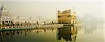 Reflection of a temple in water, Golden Temple, Amritsar, Punjab, India