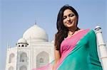 Woman with a mausoleum in the background, Taj Mahal, Agra, Uttar Pradesh, India